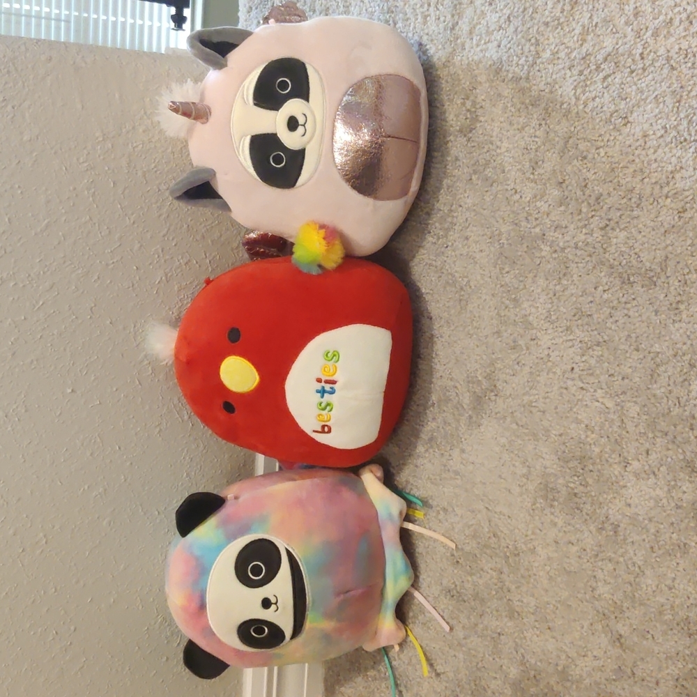 Squishmallow parrot, panda, and raccoon bundle
